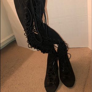 Thigh high, open toe, lace up heels. Size 9. Black.